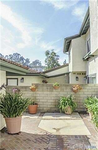 Beautiful  Front Courtyard Entry with Lockable Gat