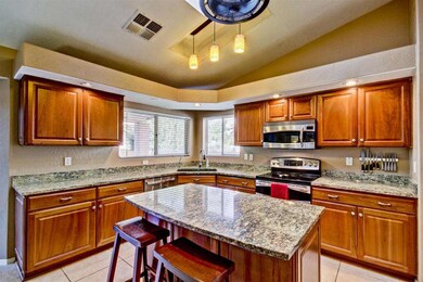 KITCHEN WITH GRANITE TOPS