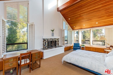 Master bedroom with vaulted ce