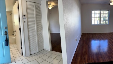 ENTRY DOOR OPEN TO BR2 HA BA & LR