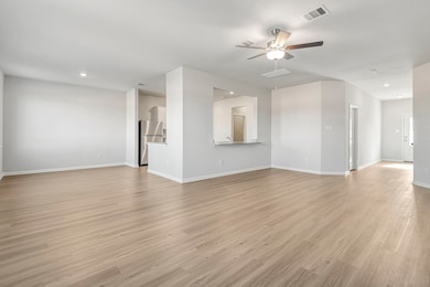 The open concept in the living room offers plenty