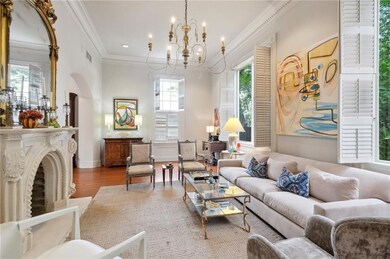 Living room with marble mantel and picture windows