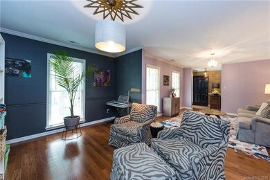 Formal dining room adjacent to formal living room 