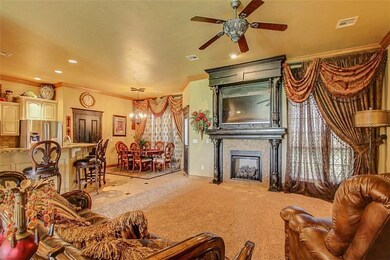 The kitchen, dining, breakfast area, and living ar