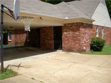Back door leads to kitchen .