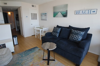 No carpet throughout is more beach-friendly.