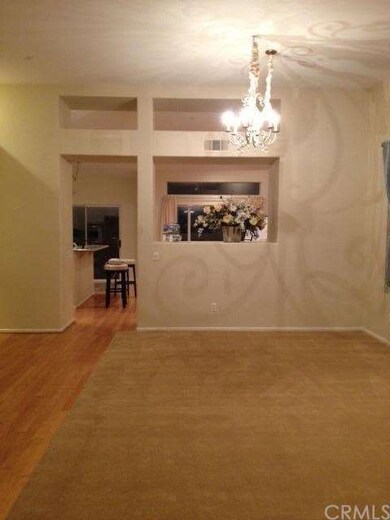 Living room looking toward family room/kitchen
