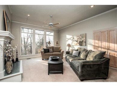 Living room with built-ins and fireplace.