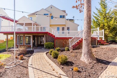 REAR EXTERIOR, 2 LEVEL DECK (43' X 24') W/ BUILT-I