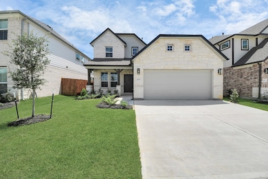 Meticulously maintained yard and lush landscape, paired with a premium elevation featuring captivating brick accents. Modern coach lights add a touch of contemporary elegance to the exterior.