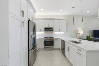 Comfortable yet classy little kitchen. Soft close wood cabinets, quartz countertops and backsplash.