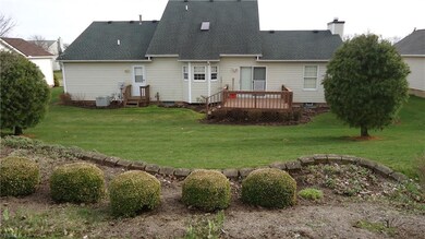 blooms will be up soon at this professionally landscaped home, rear deck, separate entrance to 1st floor laundry