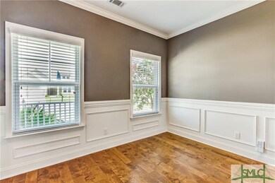 10 x 11.7 flex room with judge paneling. This room