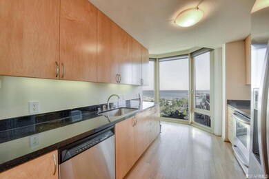 Gourmet kitchen with large bay window to the bay &