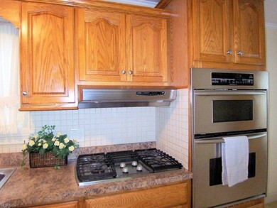 Gas cooktop, built in microwave and over