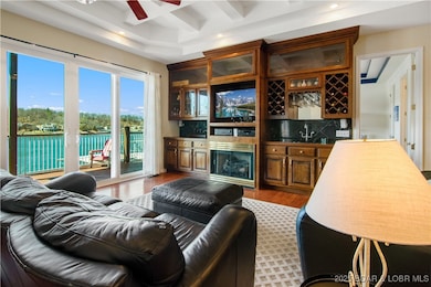 The lower level lounge.  Wet bar, entertainment ce