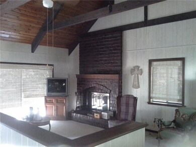 Large windows in the family room provide a great v