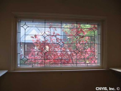 Dining Room. LEADED AND BEVELED GLASS WINDOW IN DI