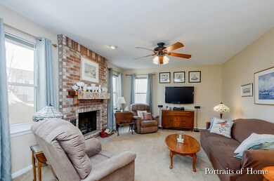 Family room with cozy wood burning fireplace