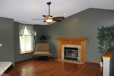 LR with hardwood floors and vaulted ceiling...