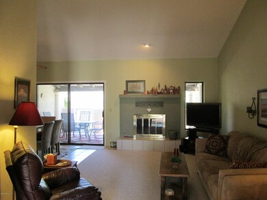 Living room w/gas FPL, Cathedral Ceiling