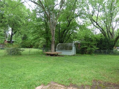 Beautiful, level, fenced yard is ready for lawn ga