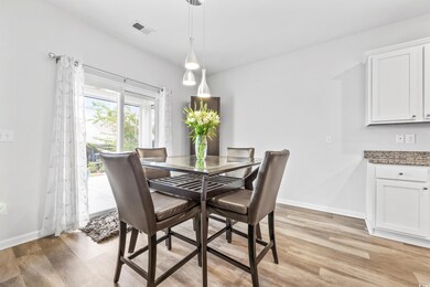 Dining room featuring light hardwood / wood-style 