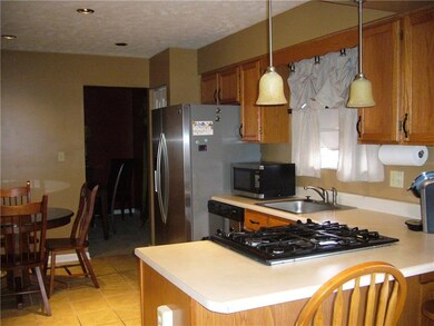 Eat-in kitchen with a breakfast bar and access to 