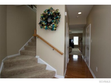 Foyer Features Coat Closet ~ Door to Garage ~ Half
