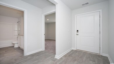 Entryway with light wood-type flooring