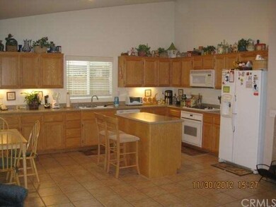 Kitchen w center island, corian countertops and va