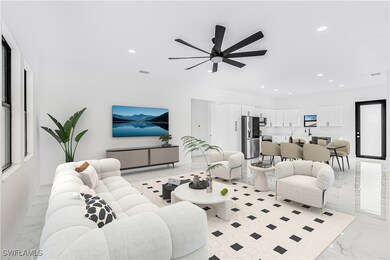 Living room featuring marble finish floor, visible