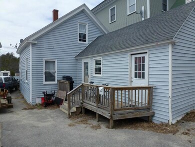 Deck and back entrance of single...