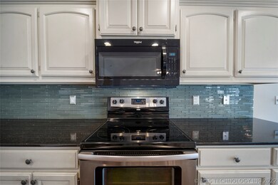 Stainless steel range and microwave vent hood.