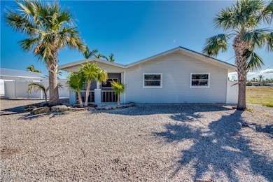 16040 Tortuga St, Bokeelia, FL 33922 - photo 2