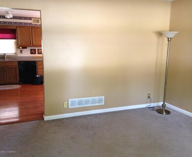 LIVING ROOM FLOWS TO THE KITCHEN