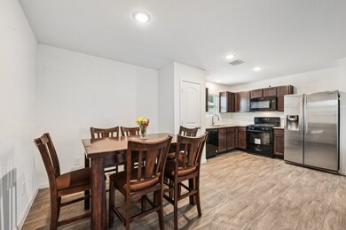 Open View of the Dining Area and Kitchen