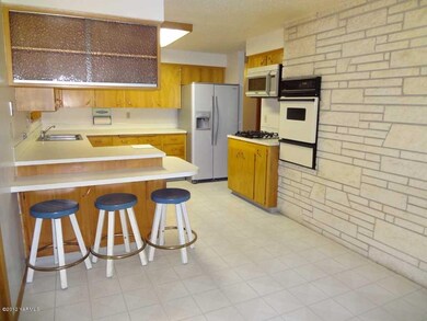 Full View of Kitchen with Eating Bar