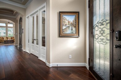 Lots of architectural details set this home apart.  Archways, crown molding, tray ceilings and hardwood floors