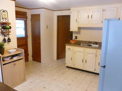 Kitchen. Kitchen and porch entry
