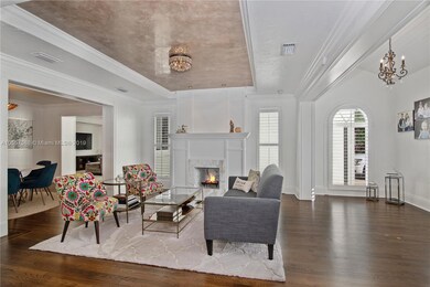 4514 Alhambra formal living room with fireplace and venetian placed tray ceiling 