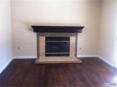 Family Room with Fireplace and Hardwood Floors