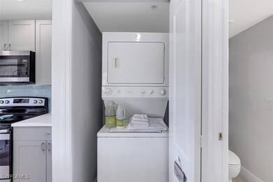 Laundry room with stacked washer / dryer