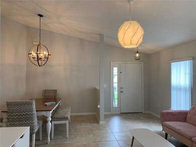 Foyer with Formal Dining and Living Room