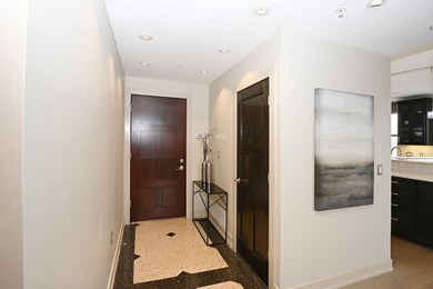 Unit 1203 entryway. Beautiful marble tile floor, c