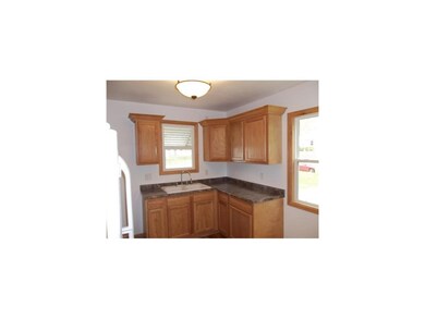 Kitchen. Eat-in Kitchen with access to side door.