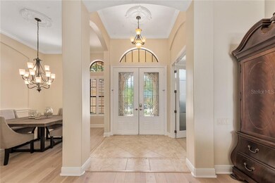 STUNNING FOYER with SOARING CEILINGS and CROWN MOL