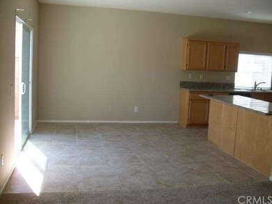 The kitchen is open to the light, bright and roomy