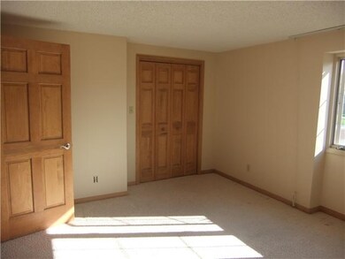 Bedroom freshly painted bedroom with natural woodw