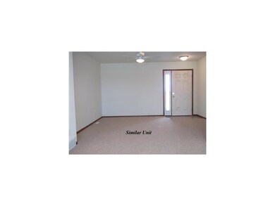 Living Room. Picture is of similar unit.